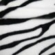 Tissu Fausse Fourrure Zebra Ras Noir